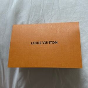 Louis Vuitton receipt envelope. Authentic in excellent condition.